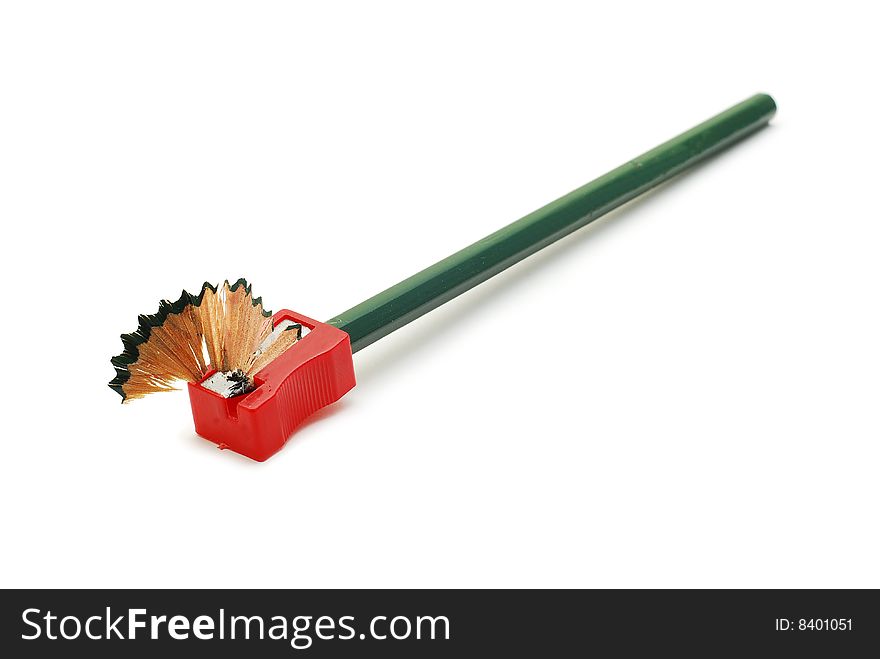 Pencil with red sharpener isolated on white. Pencil with red sharpener isolated on white