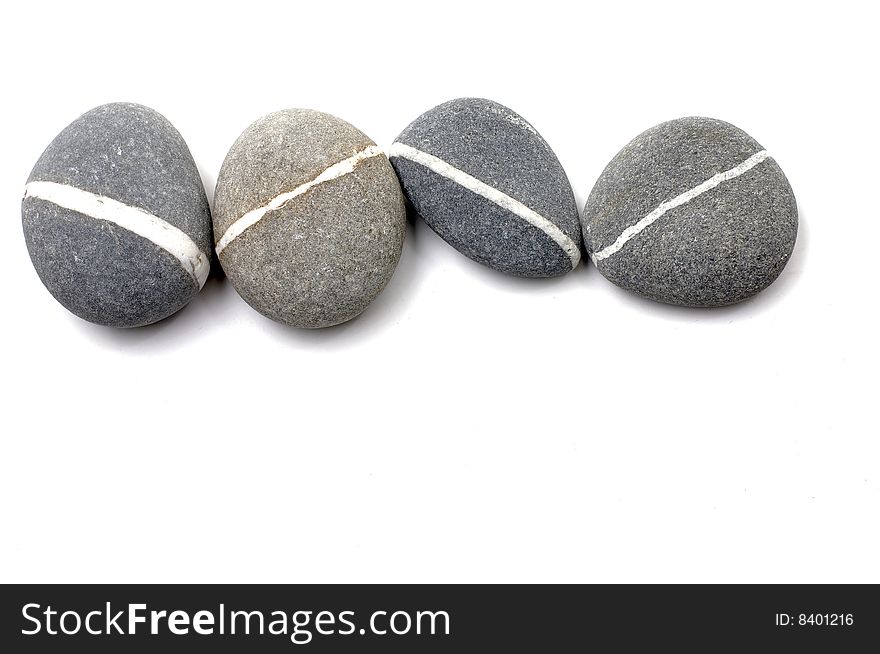 Stack of smooth pebbles over white background. Stack of smooth pebbles over white background