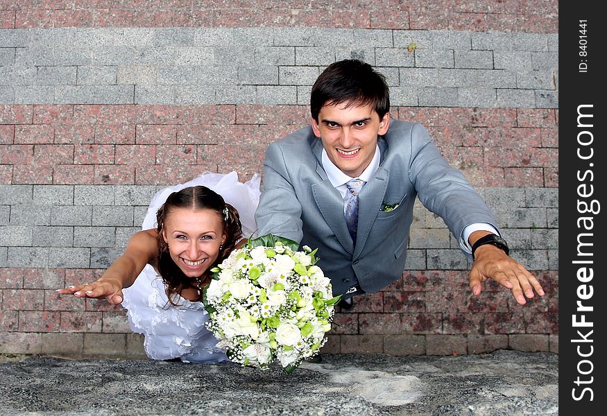 Happy newlyweds smiling  wedding day