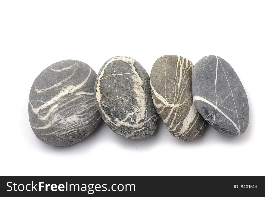 Pebbles in line on white background. Pebbles in line on white background