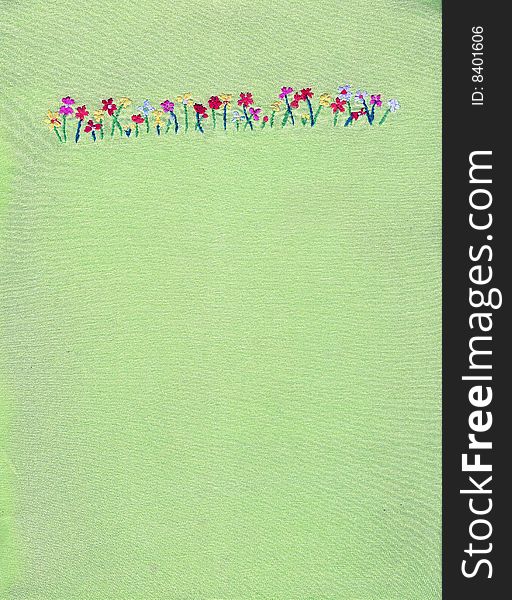 Floral embroidery on green background. Floral embroidery on green background.