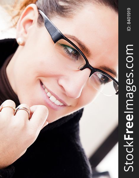 Young woman close portrait using glasses. Young woman close portrait using glasses
