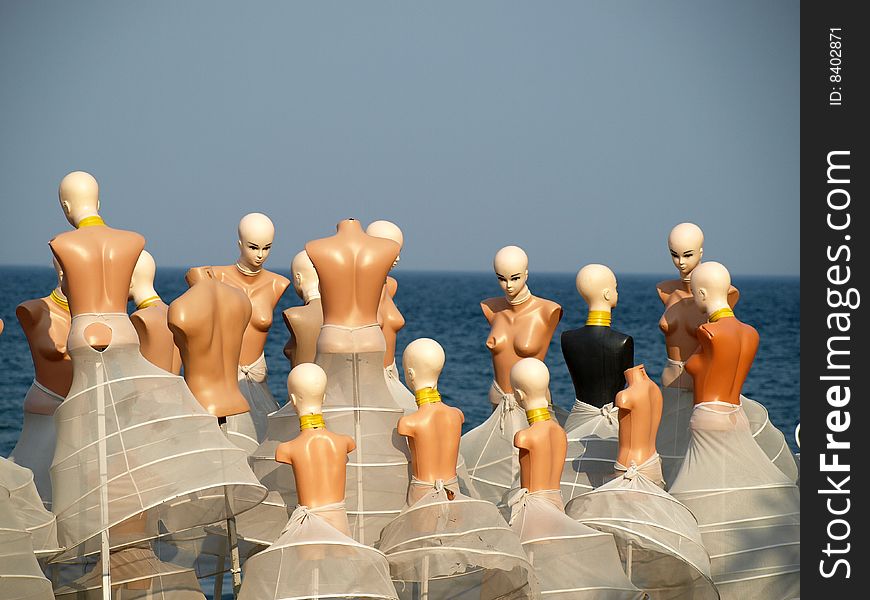 Womanish Maniken At A Sea