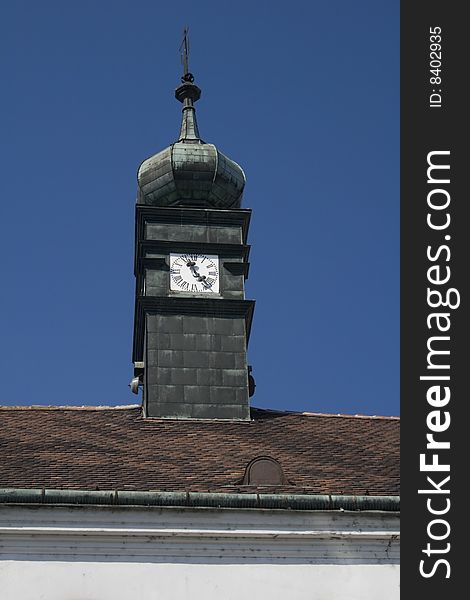 Clock in a cupola on a roof. Clock in a cupola on a roof
