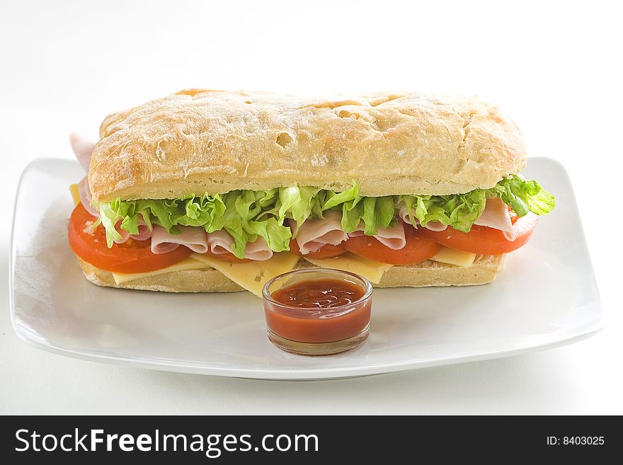 Delicious sandwich of ham cheese lettuce fresh tomato