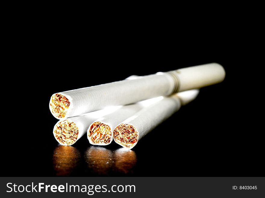 Cigarette sticks with black background. Cigarette sticks with black background