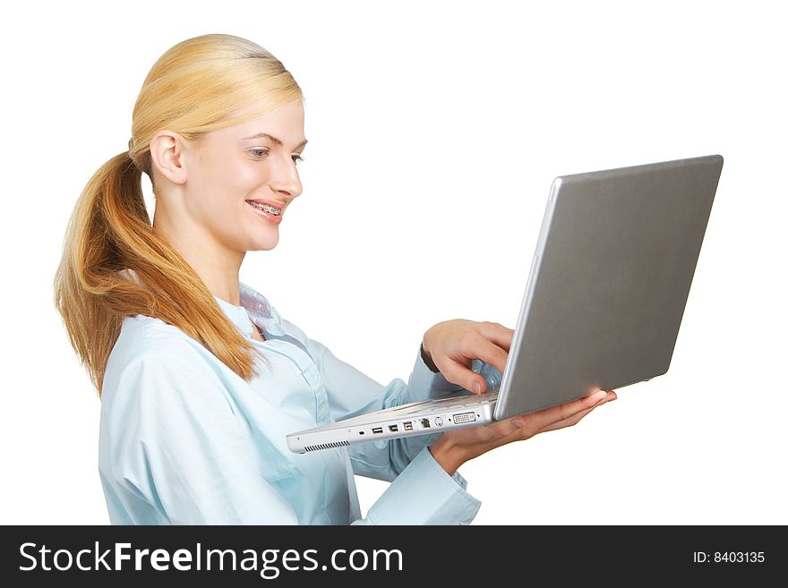 A business woman holding up her laptop isolated on white