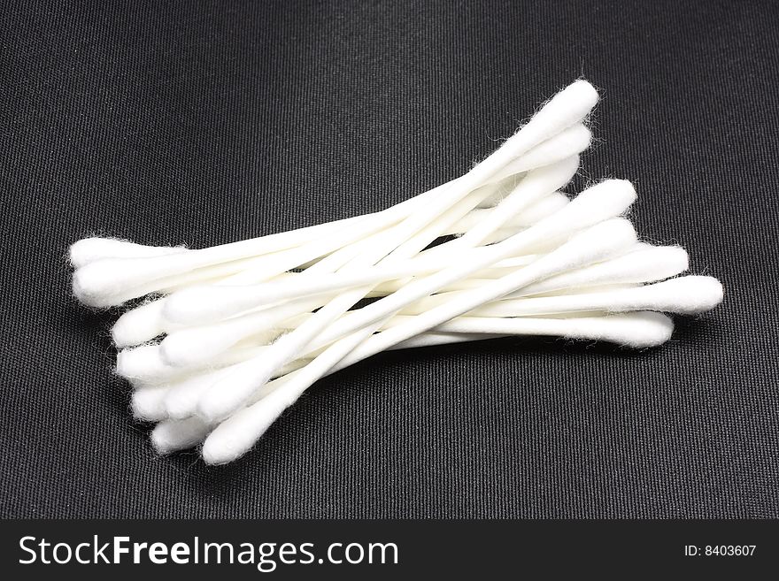 Cottons swabs isolated on a black background. Cottons swabs isolated on a black background.