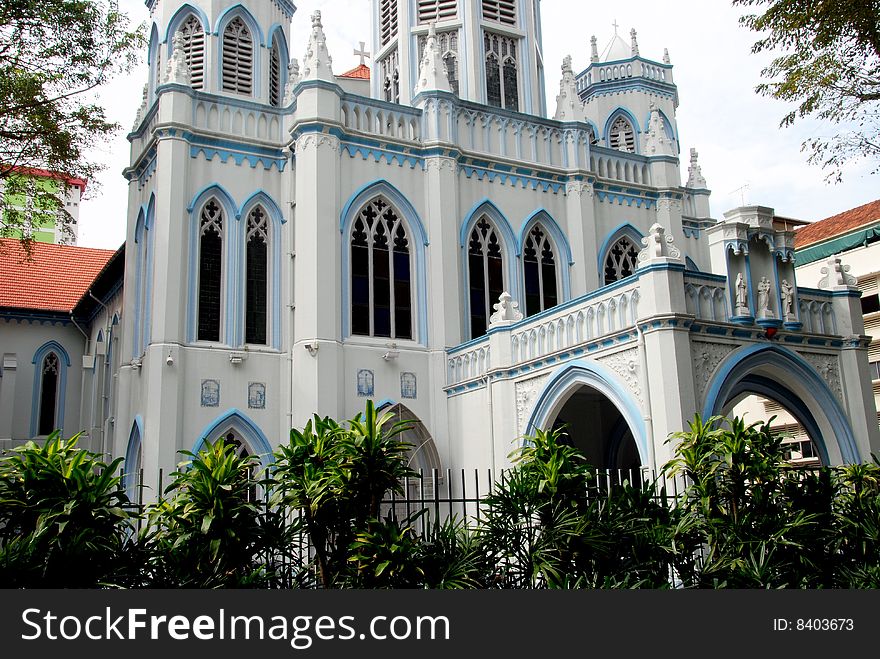 Neo-gothic facade with light blue trim of the imposing St. Joseph's Church which dates to 1912 in Singapore - Lee Snider Photo. Neo-gothic facade with light blue trim of the imposing St. Joseph's Church which dates to 1912 in Singapore - Lee Snider Photo.