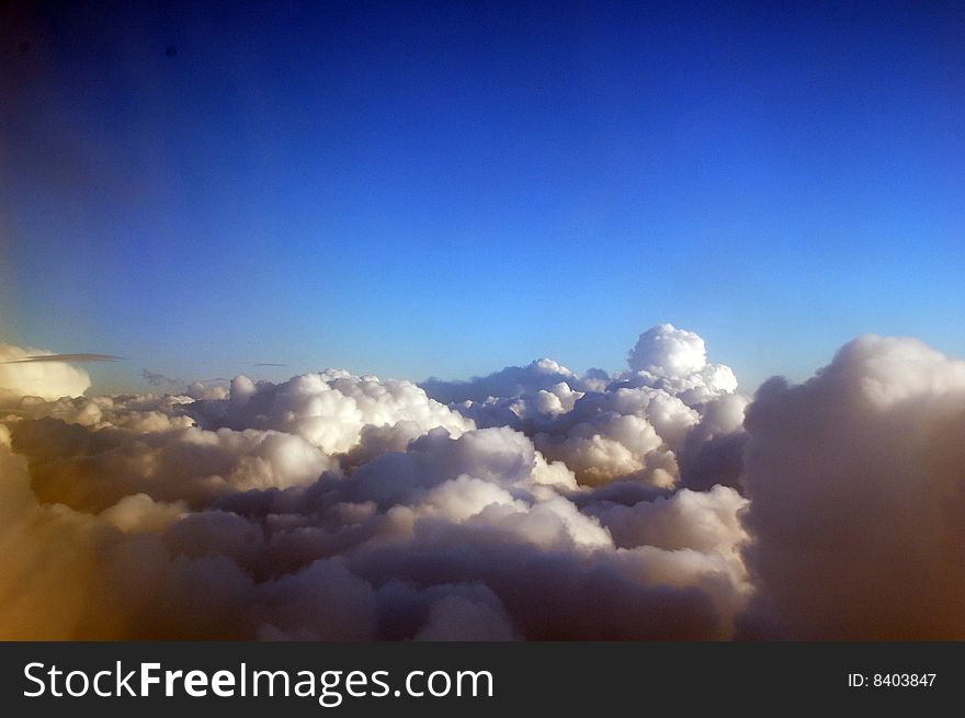 Clouds as seen from above on a beautiful sunny day over California. Clouds as seen from above on a beautiful sunny day over California