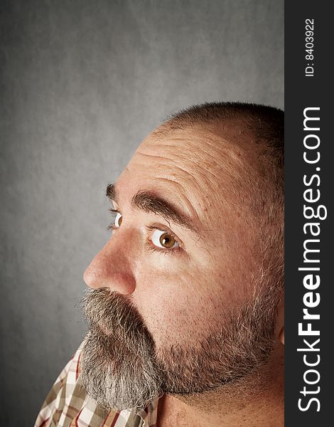 Profile closeup of a man in his forties with mustache. Profile closeup of a man in his forties with mustache