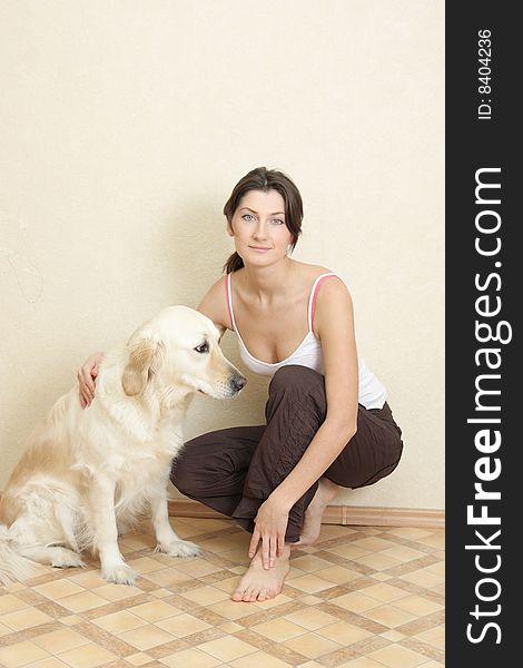 Young girl with dog labrador