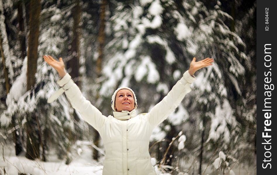 Creative photo of laughing woman in winter forest