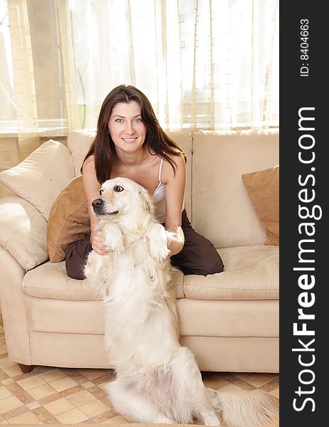 Young girl with dog labrador