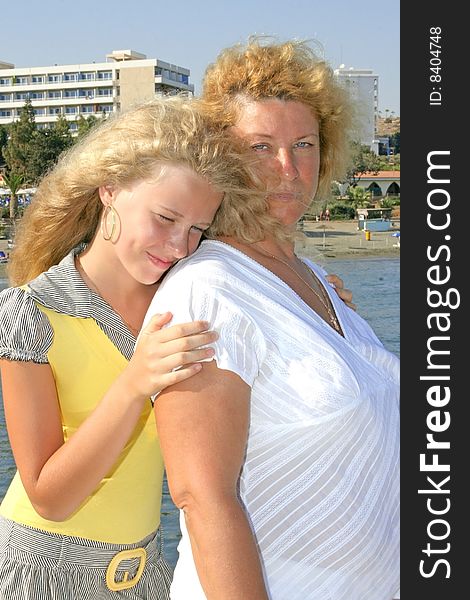 Mother and daughter at the sea.