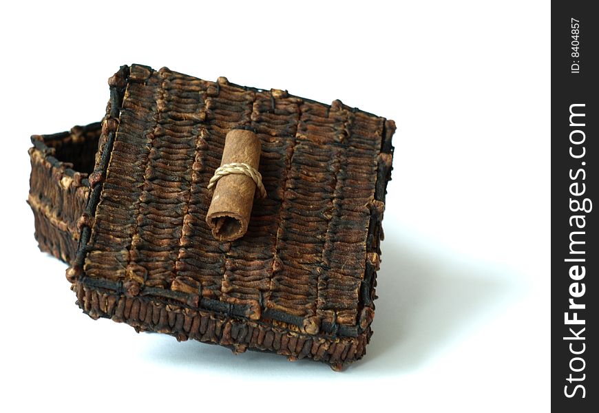 Beautiful box made of cloves and decorated with a cinnamon stick. Beautiful box made of cloves and decorated with a cinnamon stick
