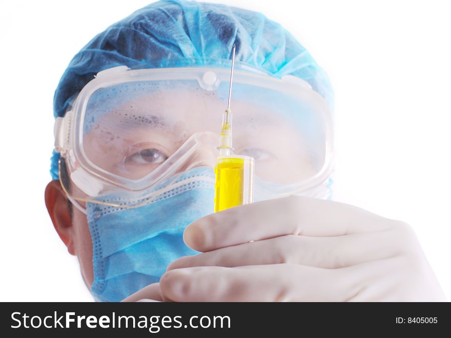 Healthcare and medicine: doctor using a syringe