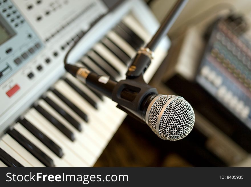 Stock photo: an image of a microphone and keyboard