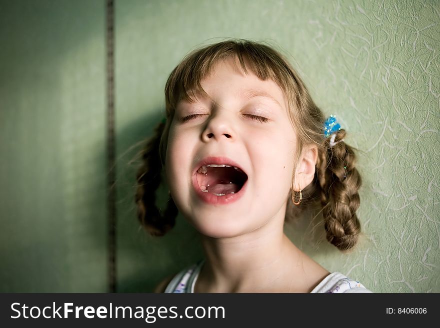 Stock photo: an image of a portrait of a singing  girl
