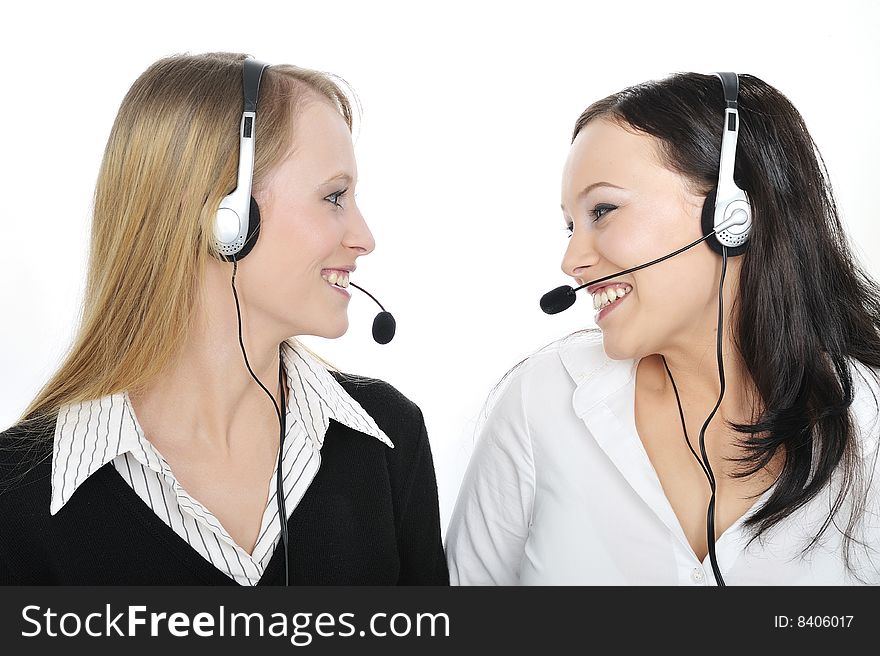 Friendly Customer Representative with headset smiling during a telephone conversation