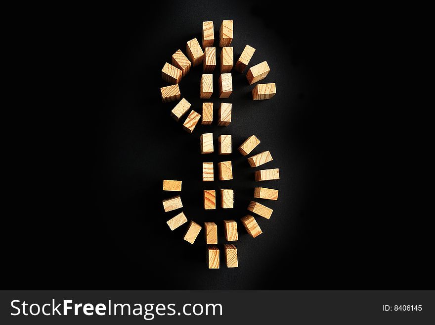 Building blocks US dollar symbol isolated on a black background