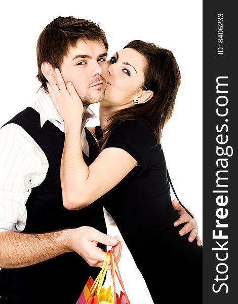 Stock photo: an image of a woman kissing a man. Stock photo: an image of a woman kissing a man