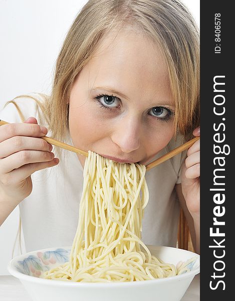 Blond Woman Use Chopsticks Eating Noodles