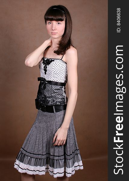 Graceful girl standing in studio