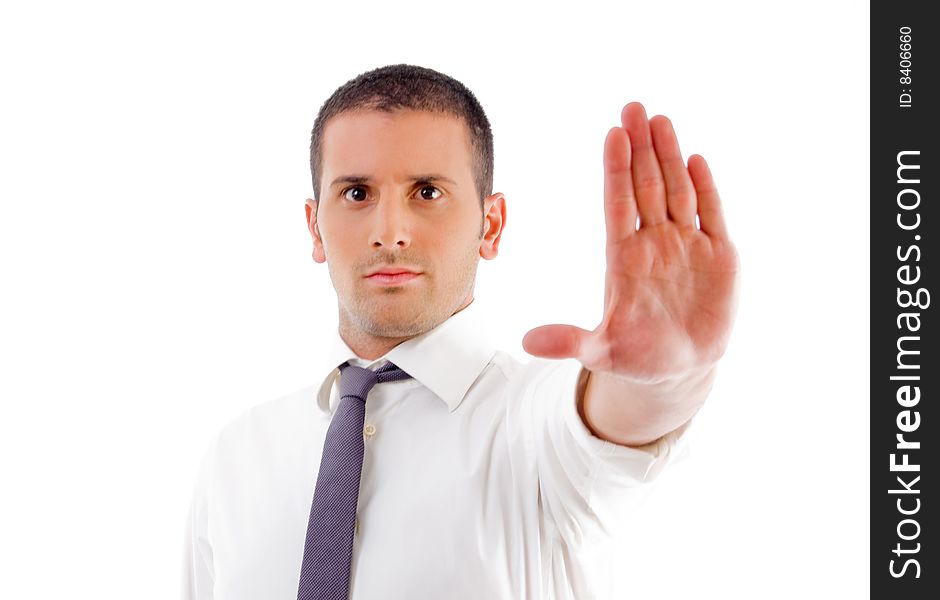 Young professional showing stopping gesture with white background