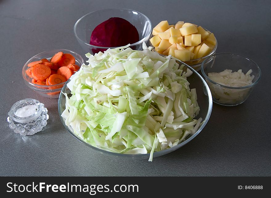 Cuted potato, onion, beet, carrot and cabbage