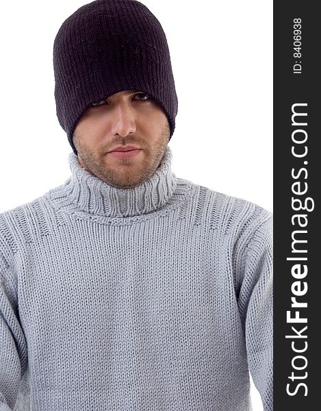 Man covered with winter clothes on an isolated white background