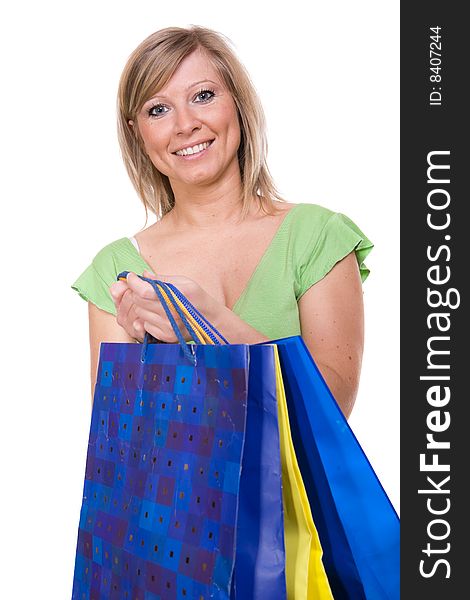 Attractive woman with shopping bag. over white background