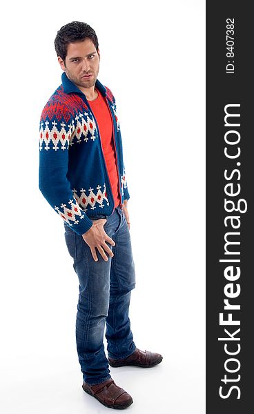 Side view of standing handsome model with white background