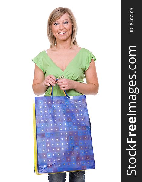 Attractive woman with shopping bag. over white background