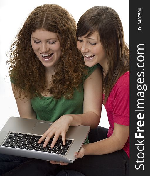 Two Teenagers With Laptop Computer