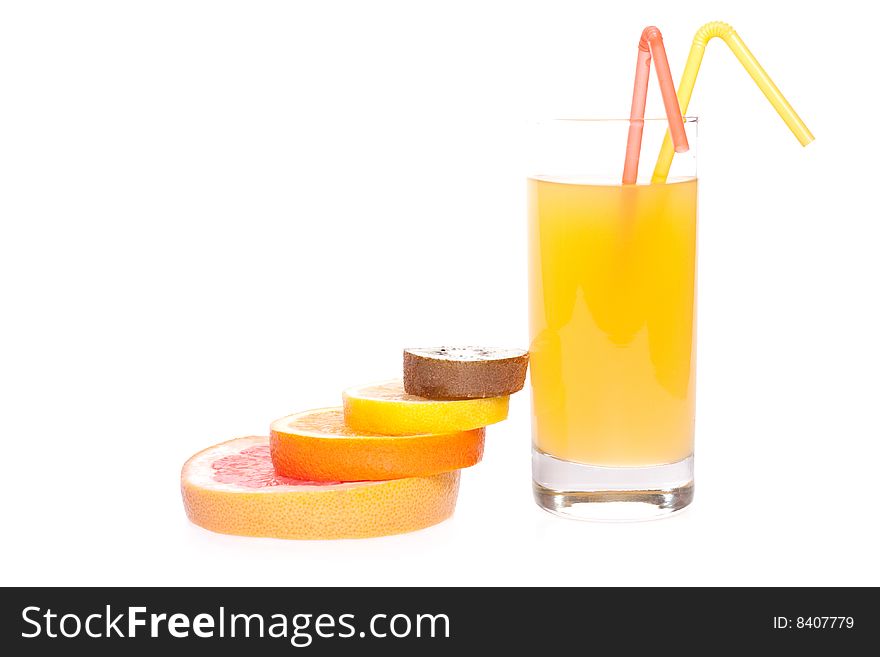 Juice in glass with orange, grapefruit, kiwi and lemon on a white background