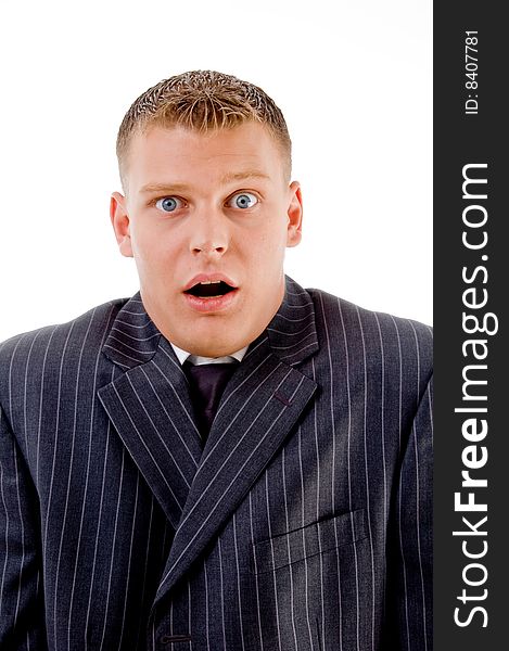 Shocking business man looking at camera on an isolated white background. Shocking business man looking at camera on an isolated white background