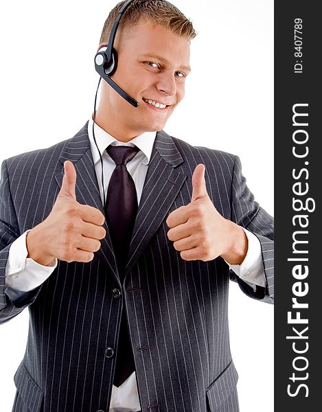 Successful businessman with thumbs up on an isolated white background
