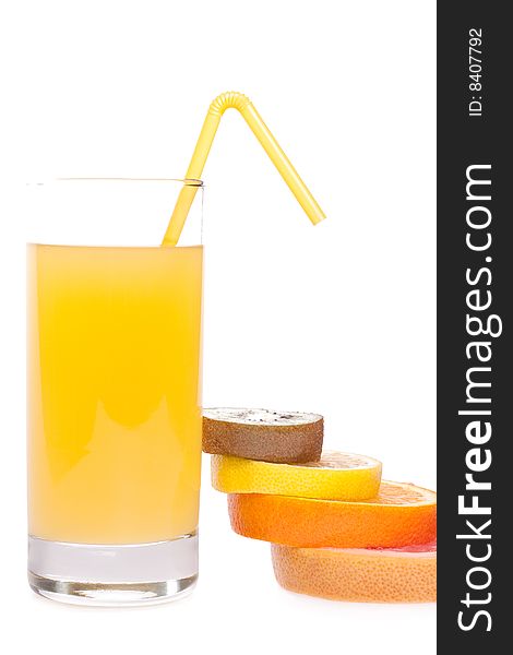 Juice in glass with orange, grapefruit, kiwi and lemon on a white background