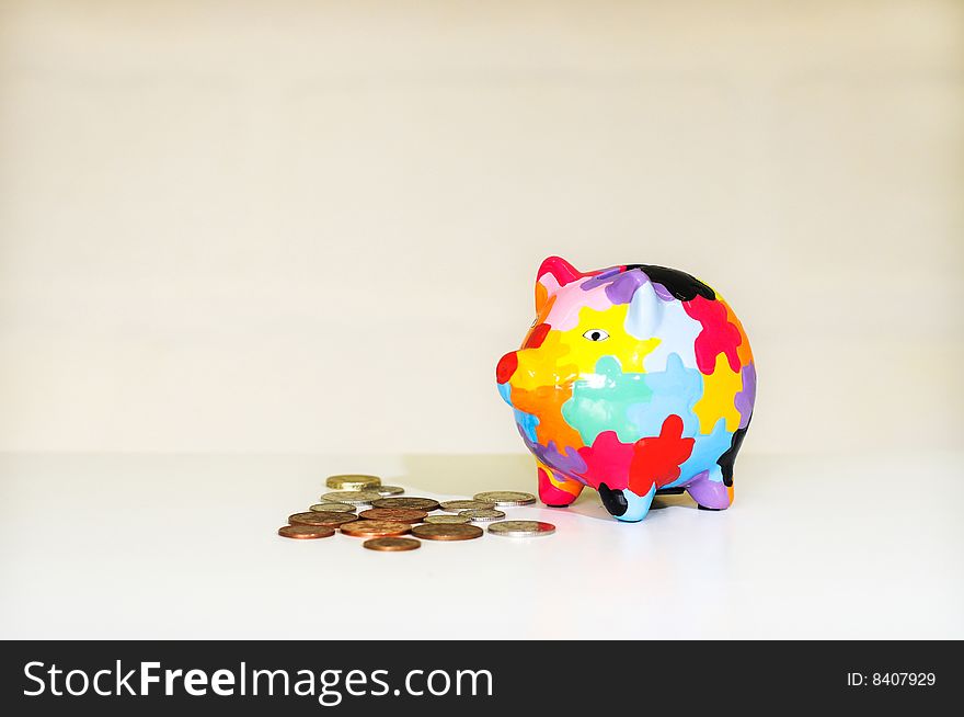 Image of piggy bank and coins. Image of piggy bank and coins