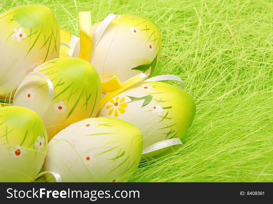 Painted Colorful Easter Eggs on green Grass