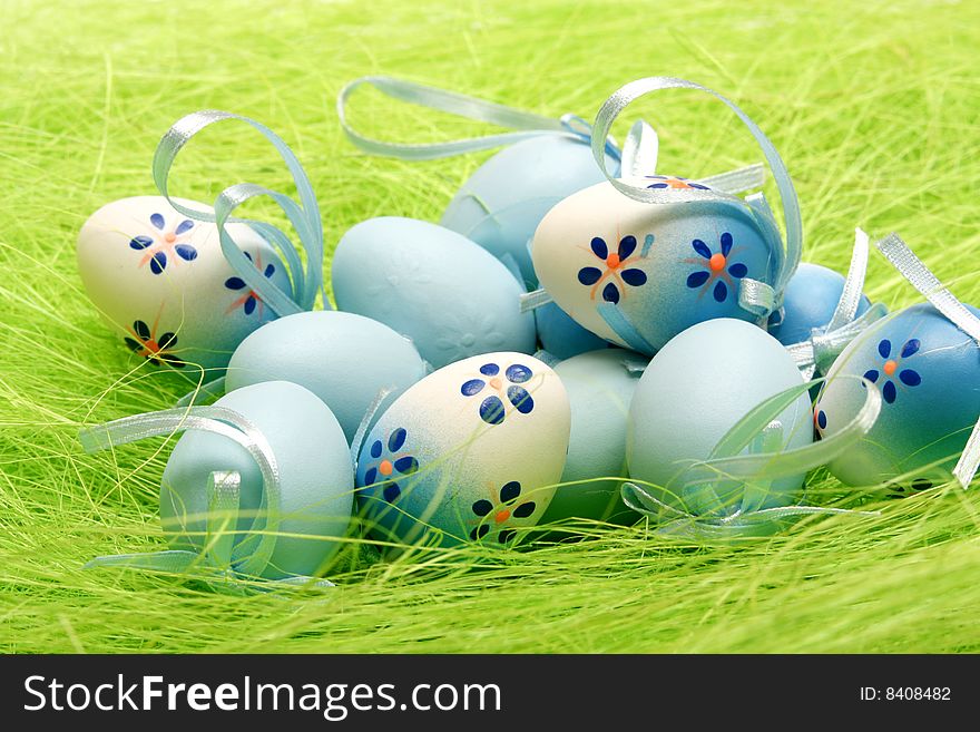 Painted Colorful Easter Eggs on green Grass