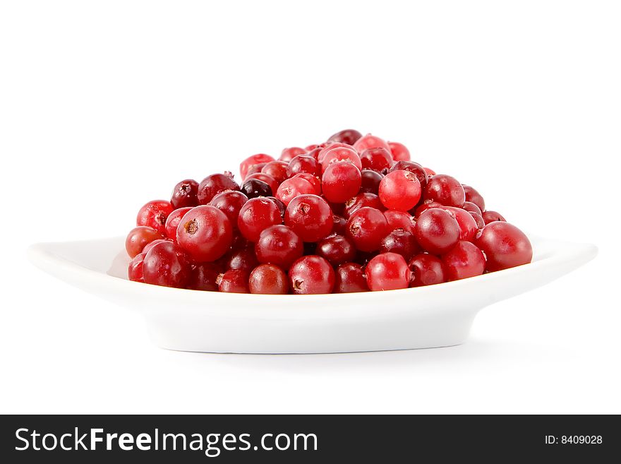 Cranberries against a white background