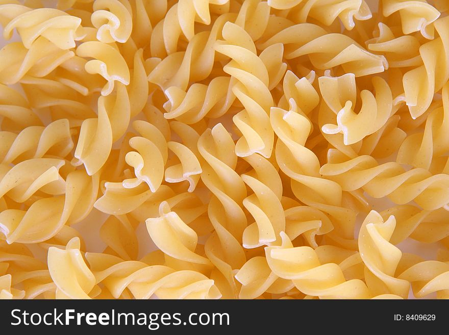 Spiral pasta background, close up