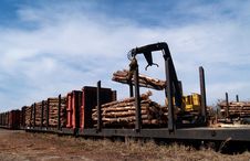Loading Logs On A Railcar Royalty Free Stock Photography Loading Logs On A Railcar Royalty Free Stock Photography