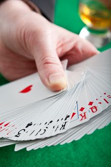Playing Cards On A Green Cloth Royalty Free Stock Images