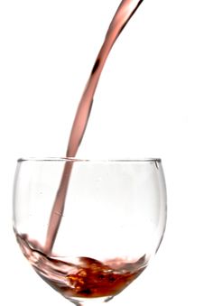 Pouring Wine Into Wine Glass Stock Photo