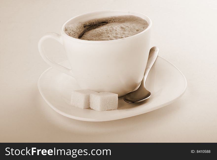 Coffee cup on a brown background