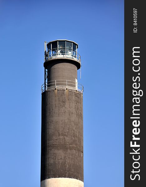 Vertical close-up view of Oak Island Lighthouse, Caswell Beach, Oak Island, North Carolina. Vertical close-up view of Oak Island Lighthouse, Caswell Beach, Oak Island, North Carolina