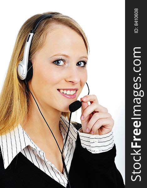 Friendly Customer Representative with headset smiling during a telephone conversation